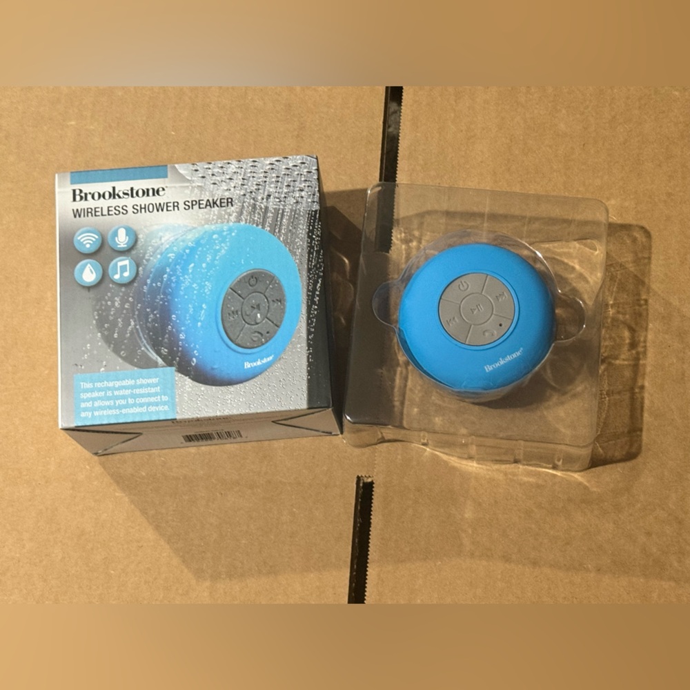 Brookstone Blue Wireless Shower Speaker